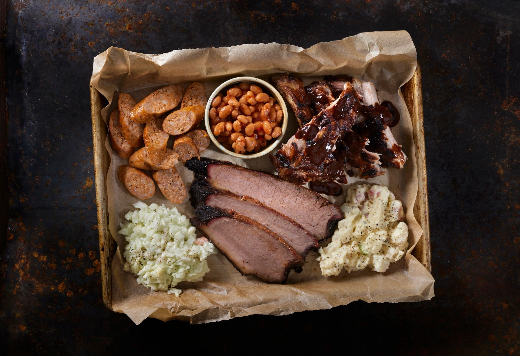 Smoked brisket platter with barbecue sides