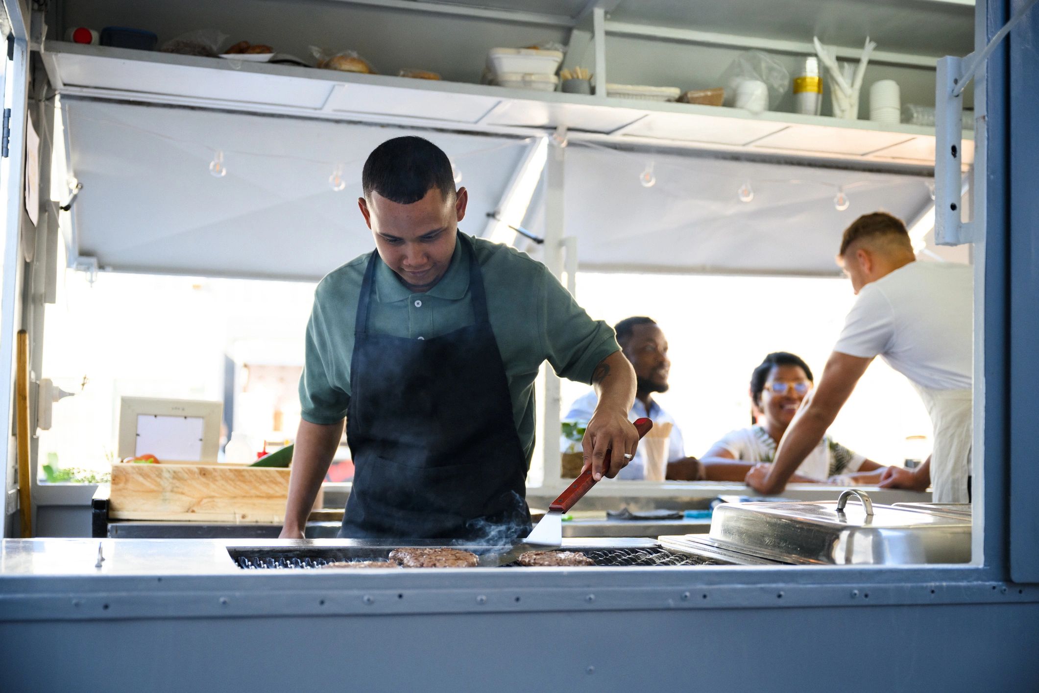 Grilling food for a catered event